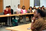 student intently listening in a classroom to Penn professor